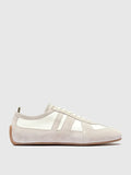 White leather sneakers shown from the side on a plain background