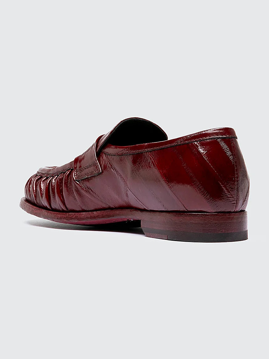 Burgundy rubber-injected sole shown from the side on a plain background